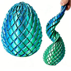 Dragon Egg Fidget Toy in sky blue and green shown upright and twisted into a flexible spiral