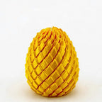 Dragon Egg Fidget Toy in bright yellow showing the layered scale pattern and egg shape