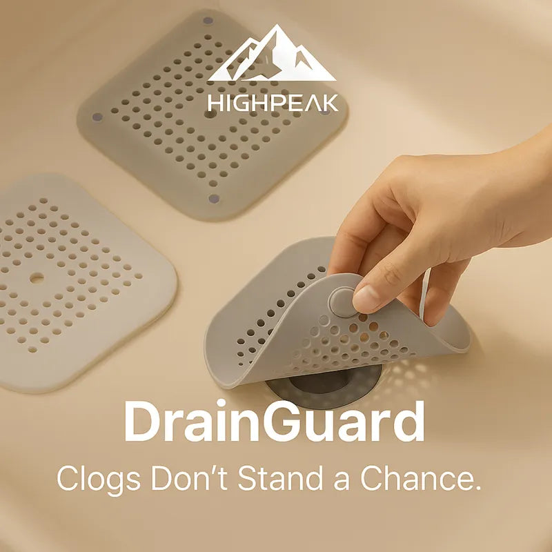HighPeak DrainGuard™ gray silicone drain cover with suction grip catching hair in a bathroom sink drain
