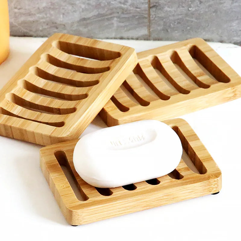 Draining Bamboo Soap Dish close-up with three natural wood trays and bar soap