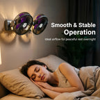 Charcoal Dual Head Portable Fan wall-mounted above a bed with its warm night light switched on