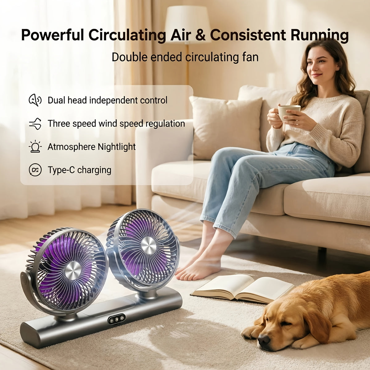 Charcoal Dual Head Portable Fan beside a sofa with a seated woman, an open book and a resting dog