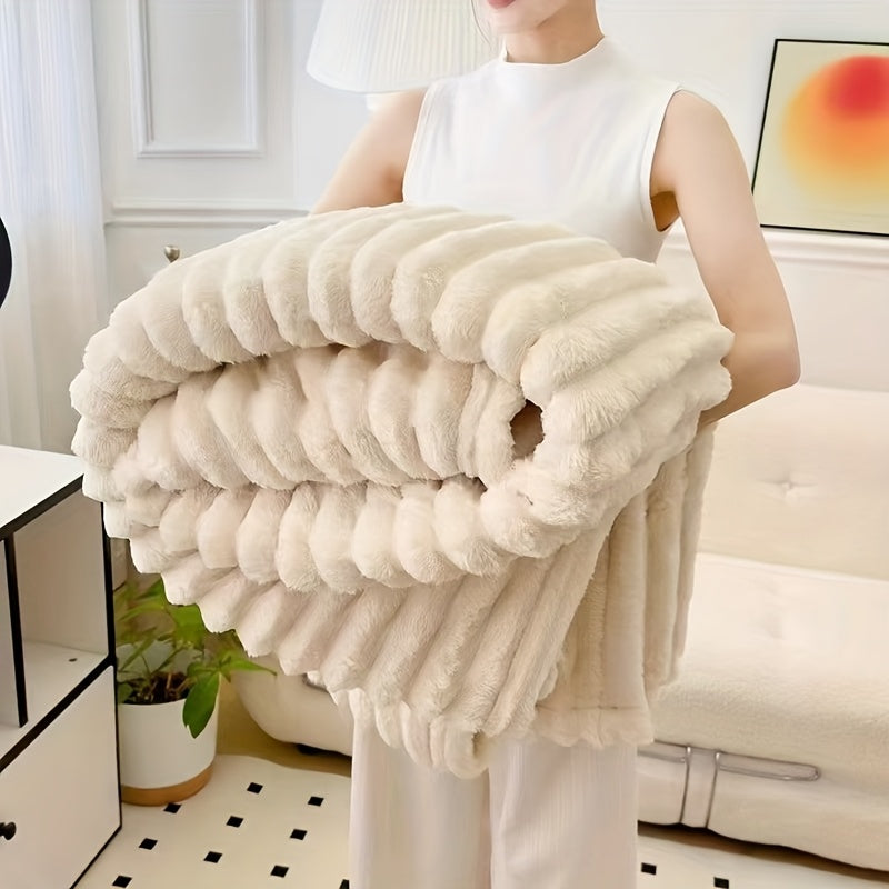 Cozy Fuzzy Blanket in cream white with plush ribbed texture, folded to show luxurious faux fur thickness