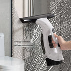 Electric Glass Cleaner clearing moisture and smudges from shower glass