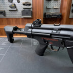 Electric SMG Gel Blaster rear close-up showing the adjustable stock, rear sight, selector, and grip