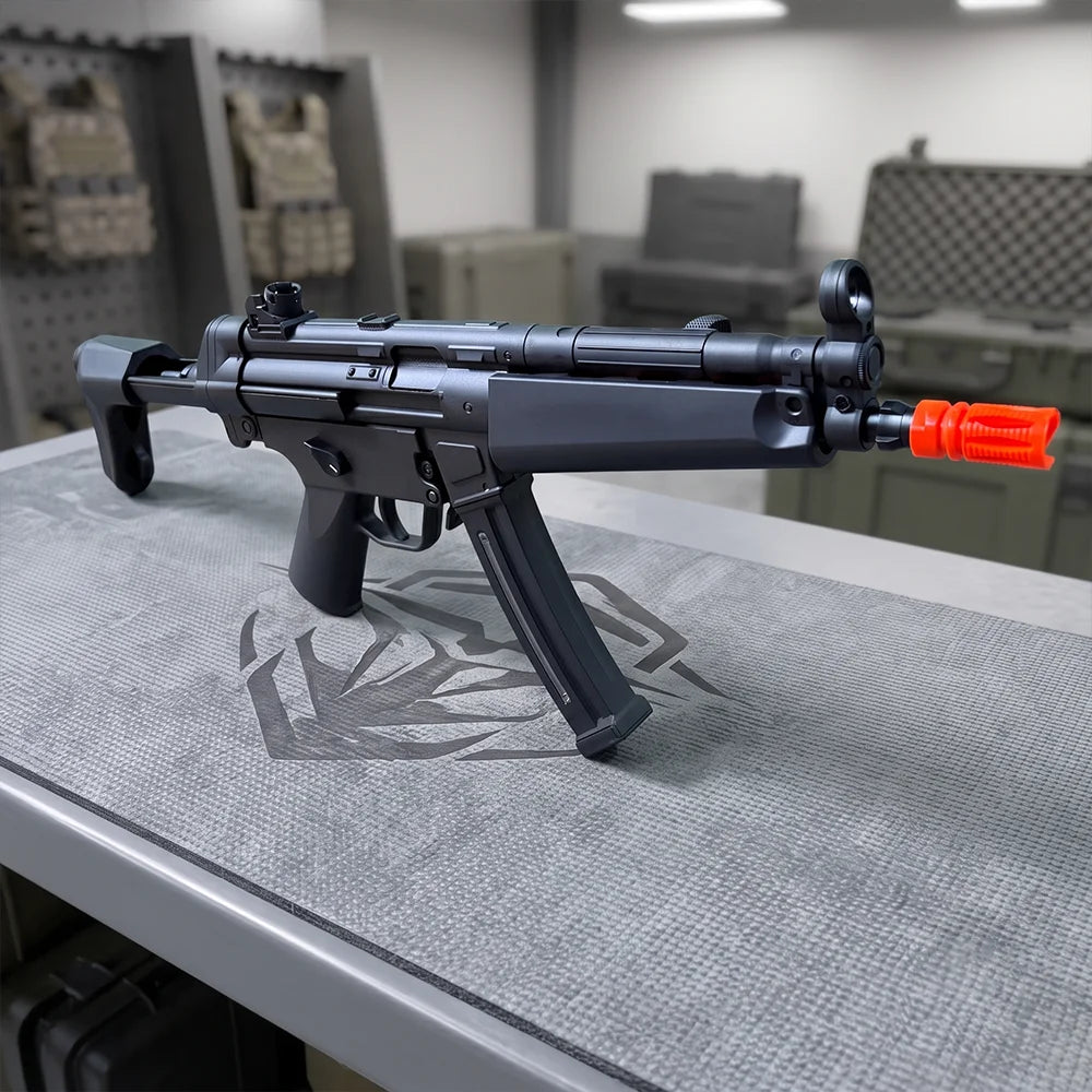 Electric SMG Gel Blaster full three-quarter view with adjustable stock, curved magazine, and orange tip