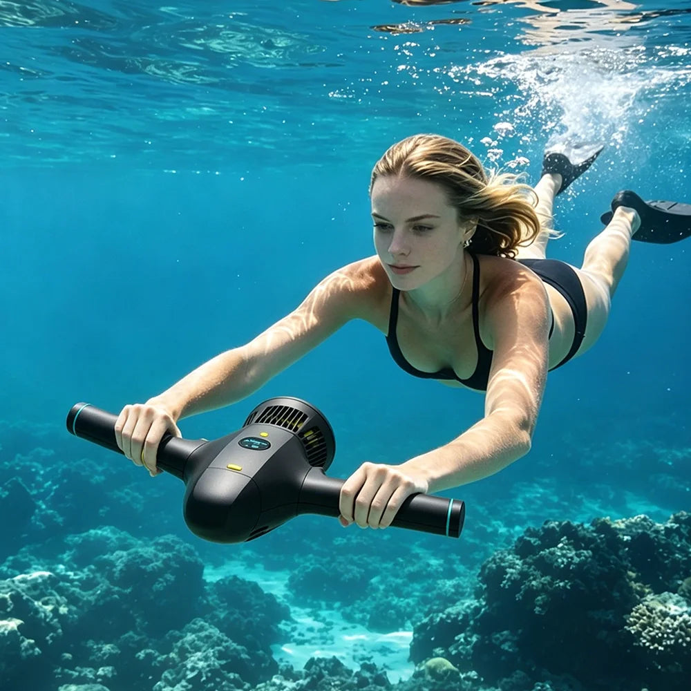 Electric Underwater Scooter used by a swimmer above a tropical reef in clear blue water
