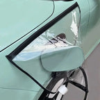 EV Charging Rain Cover — Black-edged cover draped around an open charging flap on a mint-colored car.