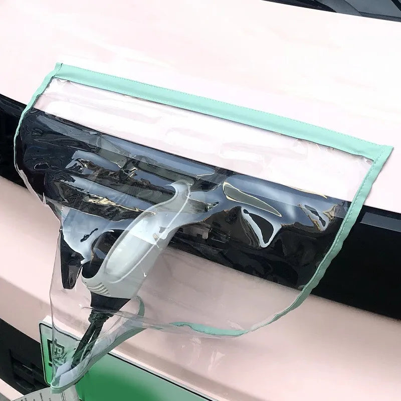 EV Charging Rain Cover — Green-edged clear cover draped over a front charging plug on a pink vehicle.