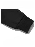 "Ew, People" Hoodie black sleeve close-up showing the wide ribbed cuff and fabric