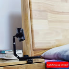 HighPeak FlexiGrip™ - Rotating Phone Mount clipped on a bedside table holding a phone, perfect for hands-free use in bed