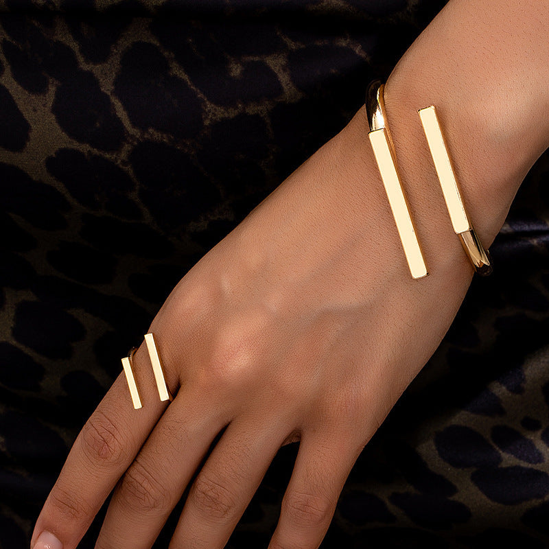 HighPeak Geometric Square Jewelry Set in gold, featuring adjustable bracelet and ring with bold clean lines on hand