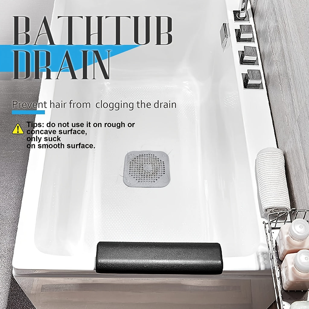 HighPeak DrainGuard™ flexible silicone drain cover in gray, installed in a white bathtub drain for clog prevention