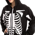 Close-up of white skeleton bone print and front zipper on black costume jumpsuit