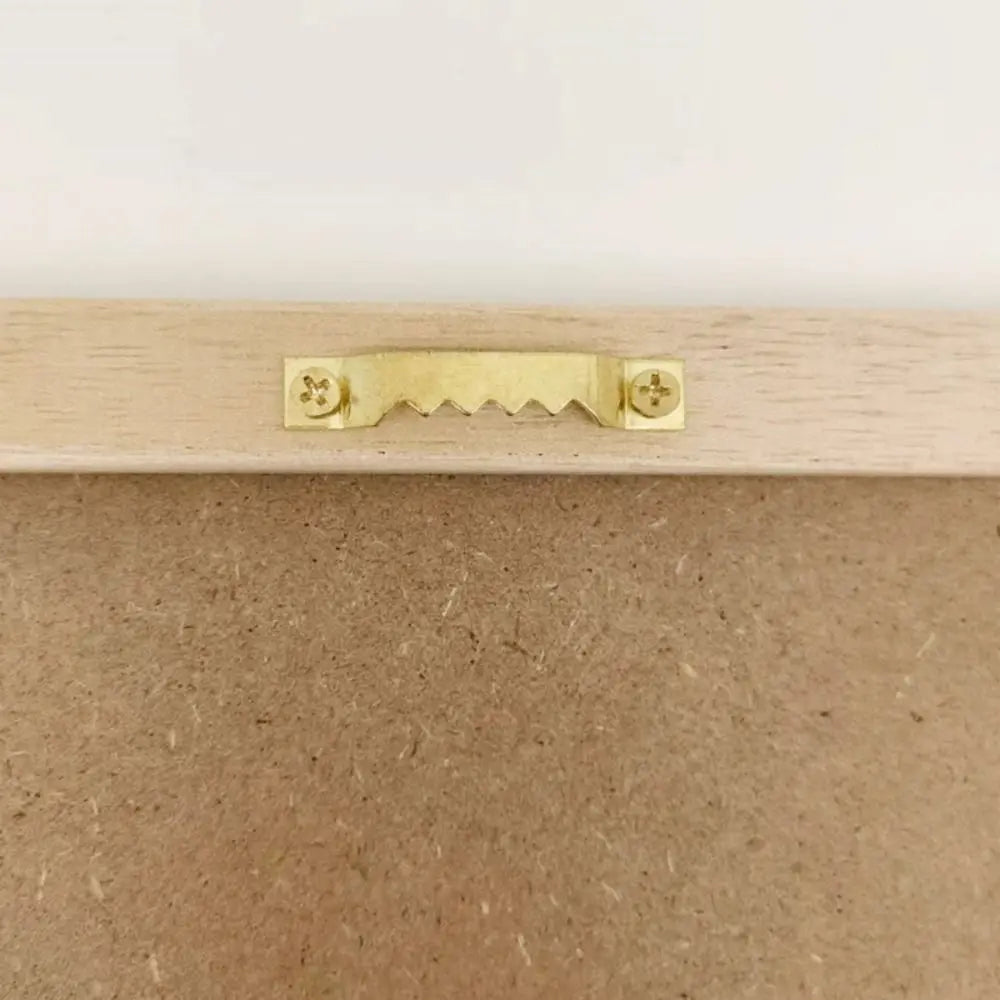 Felt Letter Board rear close-up showing the built-in sawtooth wall hanging hardware.