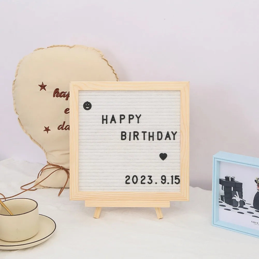 Felt Letter Board in white with black birthday message displayed on the optional wooden stand.