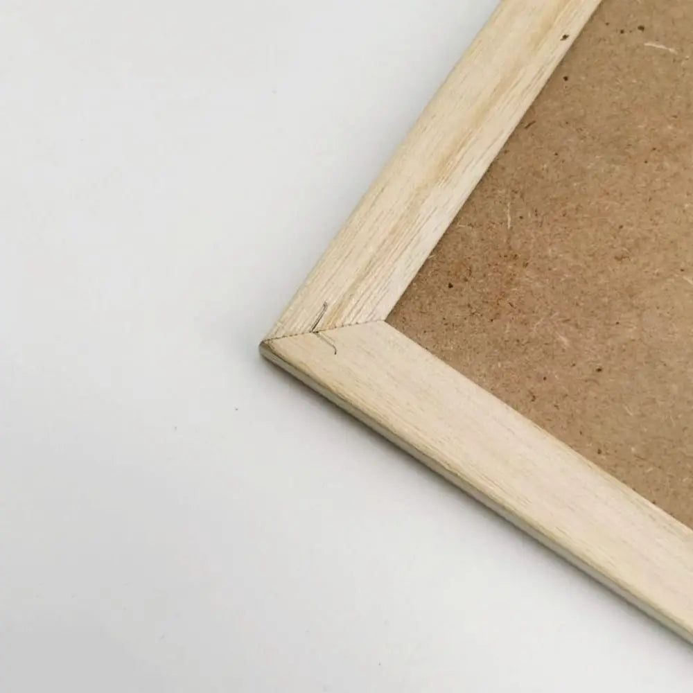 Felt Letter Board close-up showing the natural wood frame corner and rear backing.