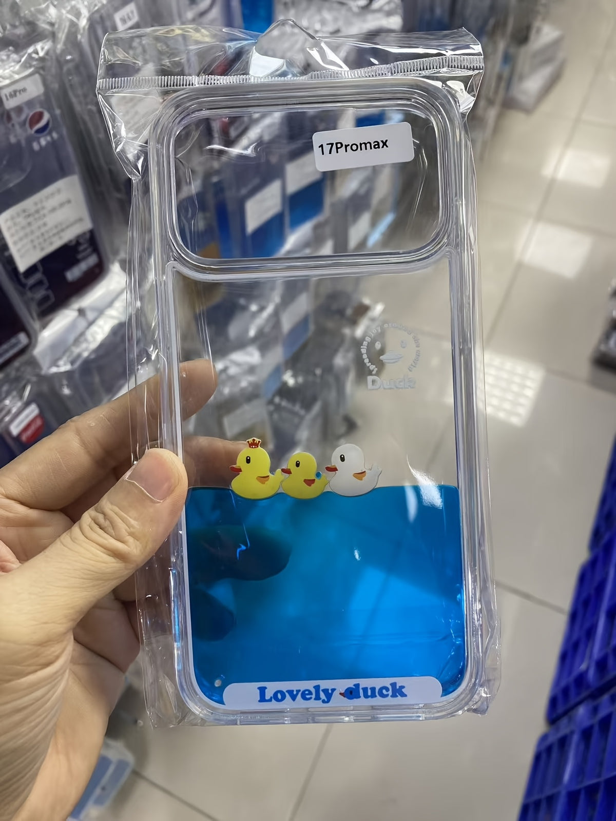 Floating Ducks Phone Case Three Ducks case in a clear bag labeled 17 Pro Max, with a wide camera opening