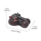 Floating Hippo Pond Decor size diagram showing the resin head at 18.5 cm long, 11.5 cm wide, and 7.3 cm high.