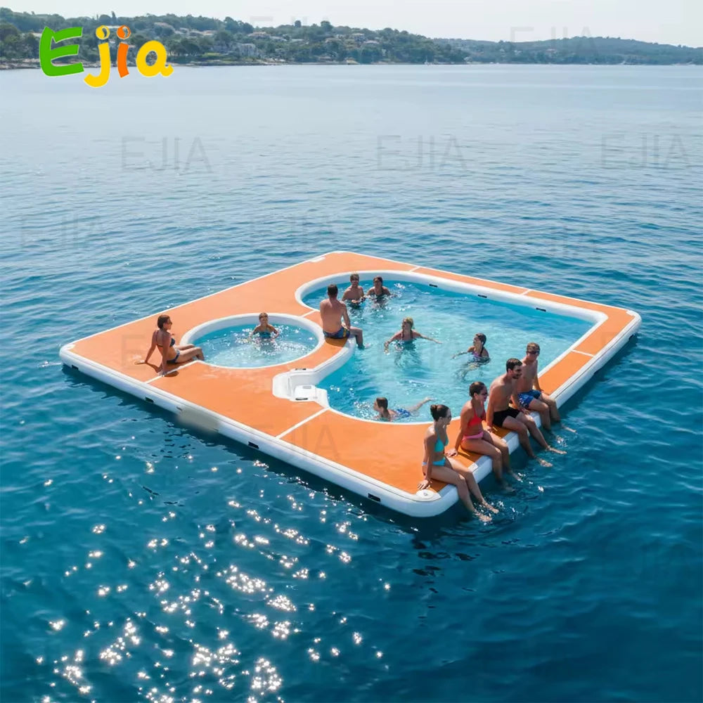 Floating Yacht Pool Dock on open water with people swimming inside the large and circular netted zones