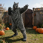 Full-Body Werewolf Costume posed with raised claws in a garden decorated with Halloween pumpkins