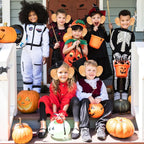 Group Halloween costume photo showing oversized ear headbands worn on a porch