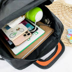 Funny Cartoon Backpack open interior holding books notebooks a phone bottle and small daily items