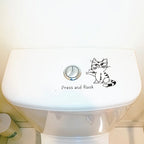 Funny Cat Toilet Sticker installed neatly on a white toilet tank beneath a round flush button