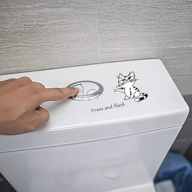 Funny Cat Toilet Sticker on a modern white toilet tank in a grey bathroom setting