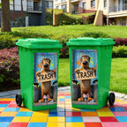 Funny Dog Bin Sticker displayed on two green trash cans beside a landscaped residential garden