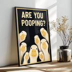 Funny Goose Bathroom Sign on a sunlit shelf beside dried flowers; black display frame not included