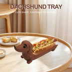 Funny Hot Dog Tray carrying a hot dog on a round dining table in a warm home setting.