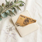 Funny "Official Credit Card" Cover with portrait artwork beside a cream card wallet