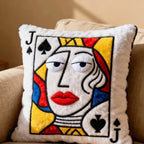 Funny Royal Card Pillows Jack design styled on a beige sofa with bold red, blue, and yellow accents