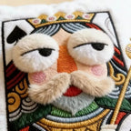 Funny Royal Card Pillows King close-up showing stitched crown, fluffy eyelids, mustache, and beard