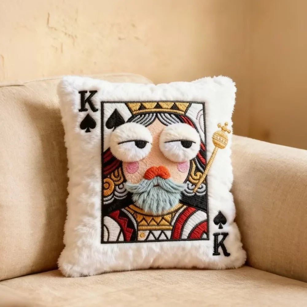 Funny Royal Card Pillows King design displayed upright on a beige living room sofa
