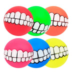 Funny Teeth Dog Balls six-color assortment in red, green, orange, pink, blue and yellow.