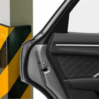 Garage Wall Protection Strip on a pillar corner beside the edge of an open silver car door