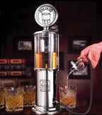 Gas Pump Drink Dispenser pouring an amber drink through its handheld nozzle into a glass at a home bar