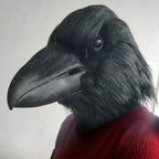 Giant Crow Head Mask tilted toward the camera, with a close view of the black beak and bird-eye detail.