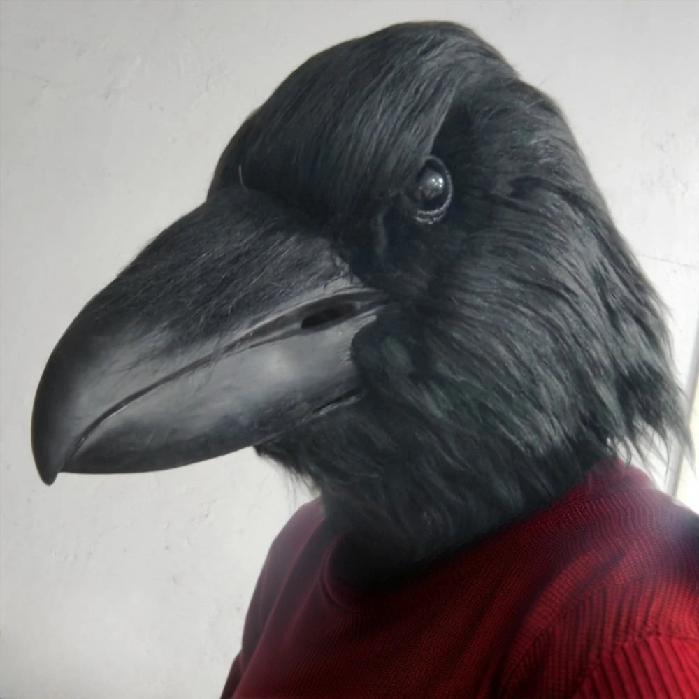 Giant Crow Head Mask tilted toward the camera, with a close view of the black beak and bird-eye detail.