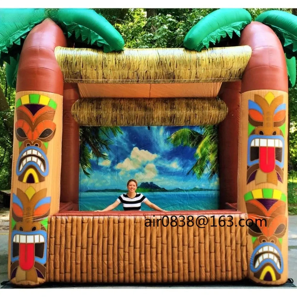 Giant Inflatable Tiki Bar frontal view with a person behind the counter and an island beach backdrop