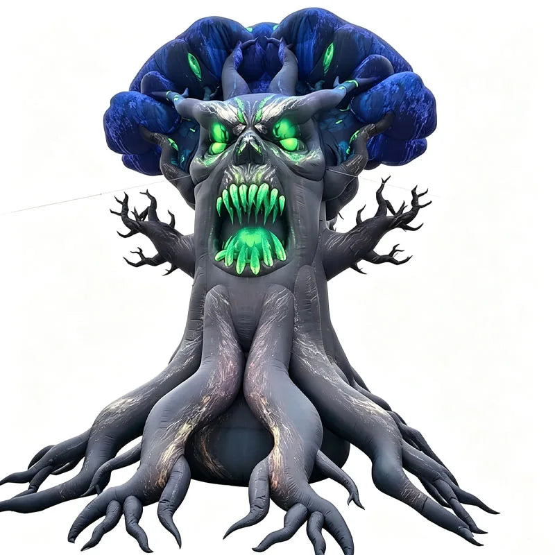 Giant Inflatable Tree Monster with a gray trunk, blue crown and green snarling face on a white background