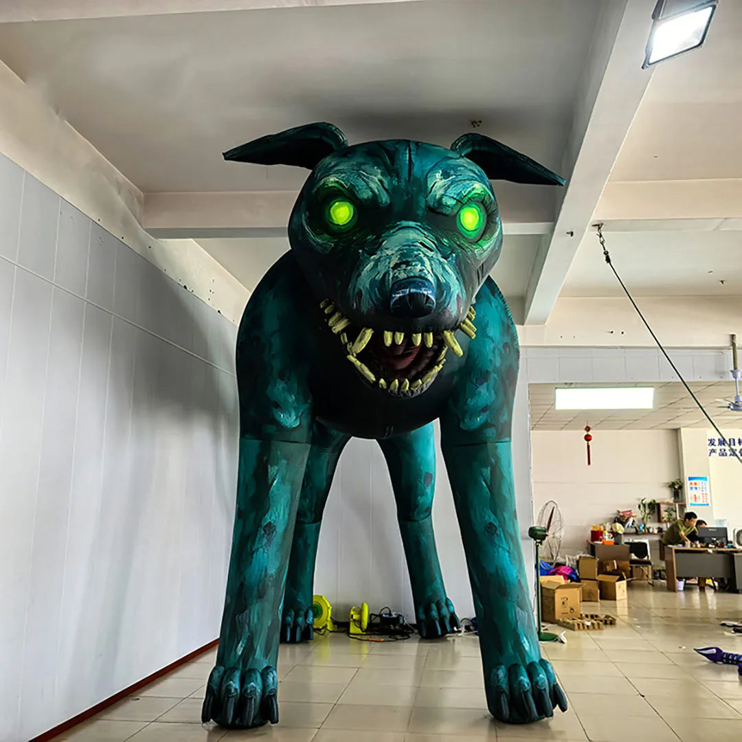 Giant Monster Wolf Inflatable front view showing teal body, vivid green eyes, long legs and snarling fangs