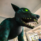 Giant Monster Wolf Inflatable right-facing low-angle close-up of the snarling face, green eye and dark chest