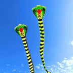 Two Giant Snake Kites shown side by side in the sky to compare their different available lengths