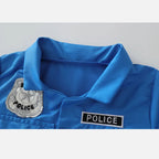 Girls Police Costume Set close-up of the blue collar and embroidered police chest patches.