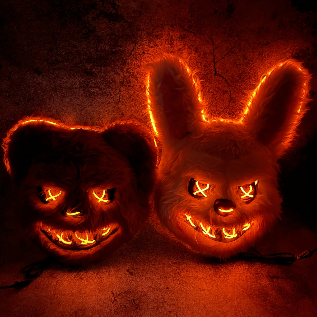 Glowing Horror Animal Masks bear and bunny side by side with orange lighting switched on