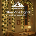 HighPeak GlowVine Lights with warm LED ivy vines draped on wall, creating cozy ambient lighting in a study nook.