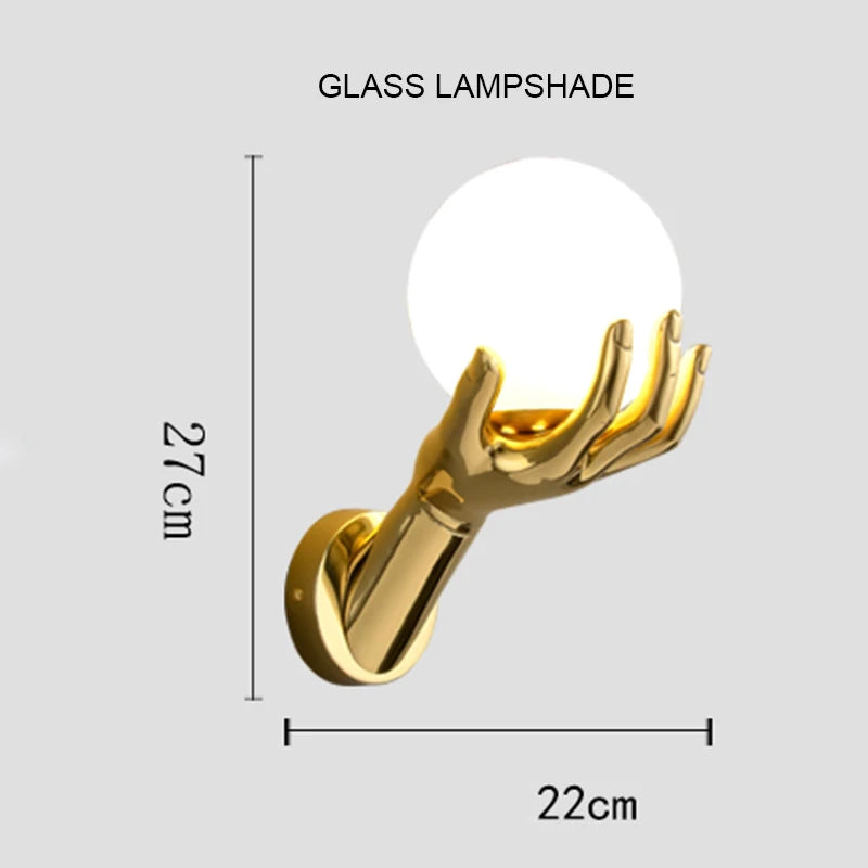 Golden Hand Wall Lamp — Glass shade size diagram showing 27 cm height and 22 cm horizontal span